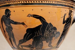 Shown here, an artifact in the Metropolitan Museum of Art showing two pankratiasts fight before a trainer and onlooker around 500 B.C.