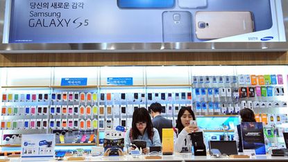 Customers at a Samsung store in Seoul