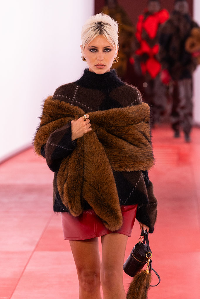 Iris Law wearing H&M argyle knit on the runway