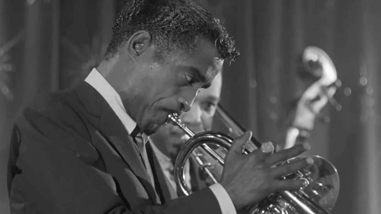 Sammy Davis, Jr playing trumpet in A Man Called Adam