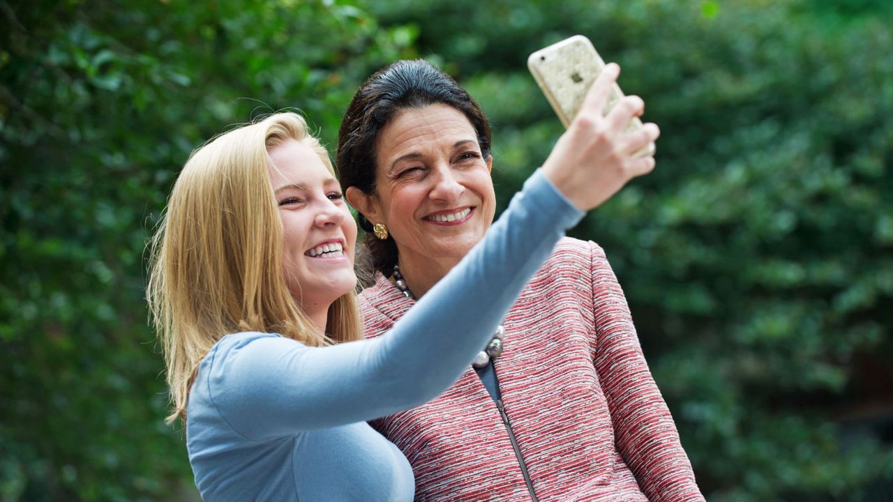 Smile, Happy, Facial expression, People in nature, Interaction, Gesture, Friendship, Love, Laugh, Sweater, 