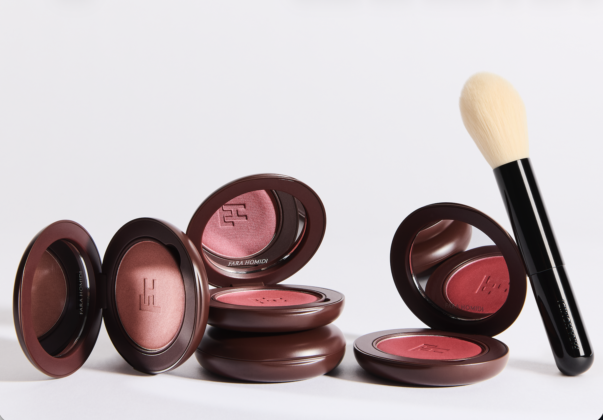 Fara Homidi Blonzer compacts