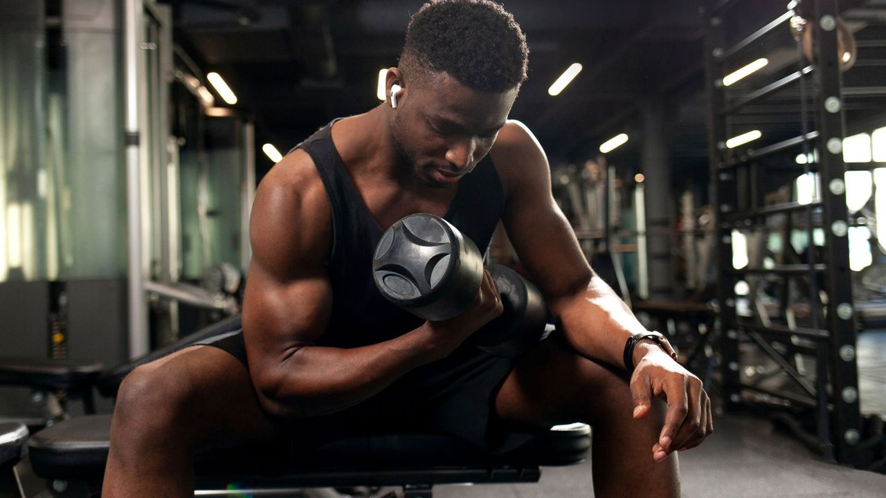 Man performing dumbbell curl