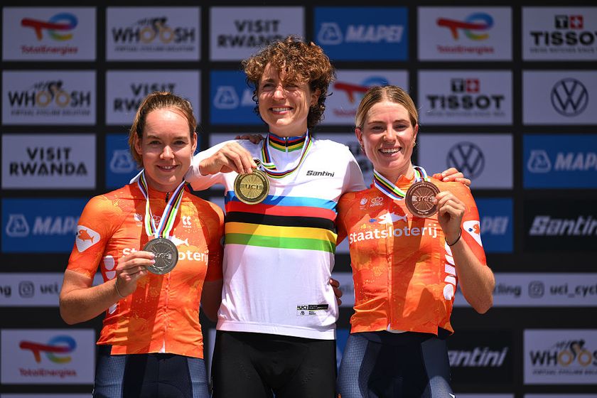 KIGALI, RWANDA - SEPTEMBER 21: (L-R) Silver medalist Anna Van Der Breggen of Team Netherlands, gold medalist Marlen Reusser of Team Switzerland and bronze medalist Demi Vollering of Team Netherlands pose on the podium during the medal ceremony after the 98th UCI Cycling World Championships Kigali 2025 - Women Elite Individual Time Trial a 31.2km race from Kigali to Kigali on September 21, 2025 in Kigali, Rwanda. (Photo by David Ramos/Getty Images)