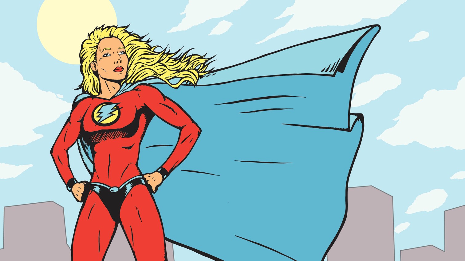 A female super hero or Superwoman stands on a roof in a red suit with a blue cape billowing behind her.
