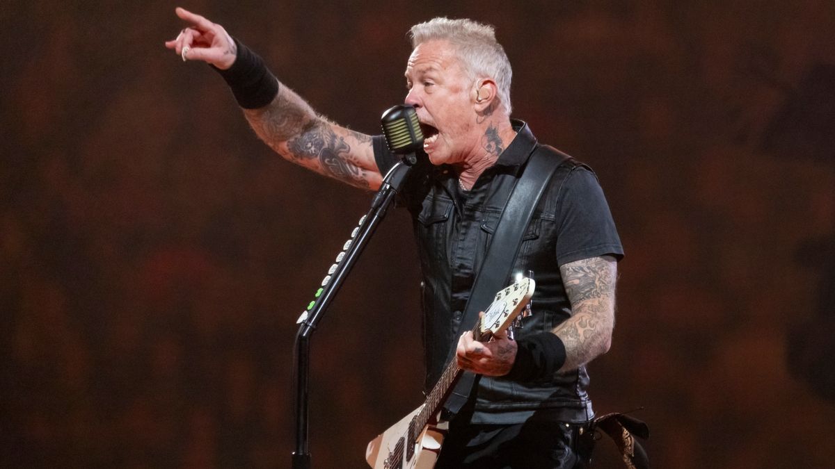 James Hetfield performing onstage in 2023