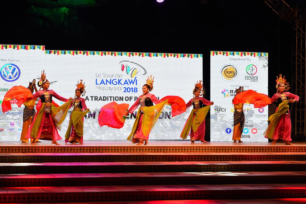 Dancers entertain the crowd at the Tour de Langkawi team presentation