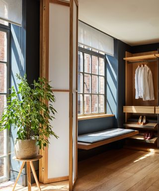 walk-in wardrobe with bi-fold screen