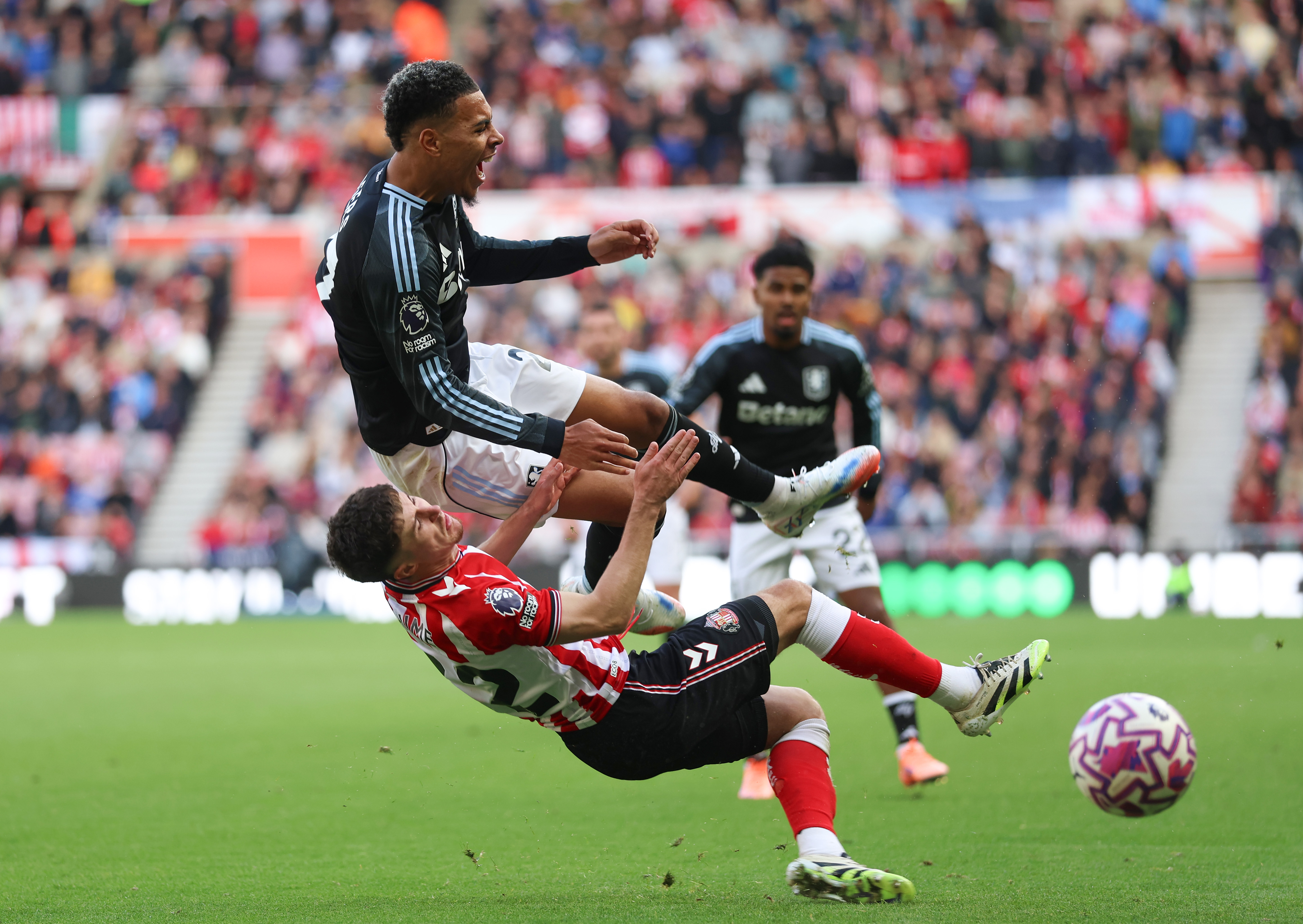 Trai Hume upends Aston Villa man Morgan Rogers