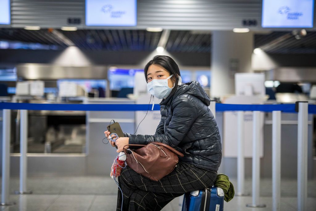 A tourist at the airport in Frankfurt, Germany.