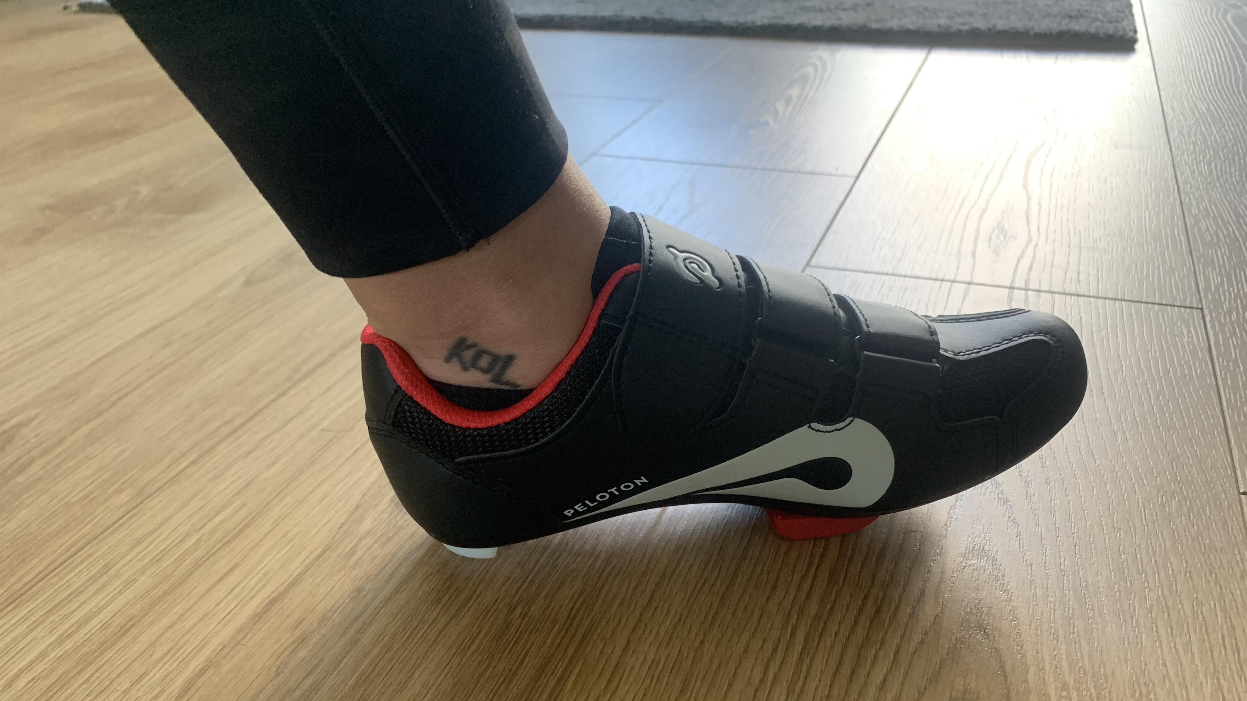Peloton cycling shoes on person's foot