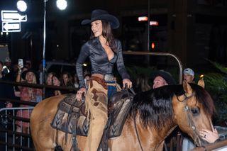 bella hadid on a horse