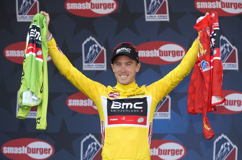 Rohan Dennis (BMC Racing) in yellow holds his green sprint and red KOM Jerseys aflot