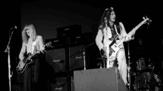 Rush’s Alex Lifeson and Geddy Lee performing onstage in 1974