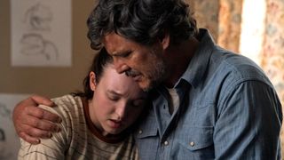 Ellie (Bella Ramsey) being held by Joel (Pedro Pascal) in "The Last Of Us" season 2 episode 6