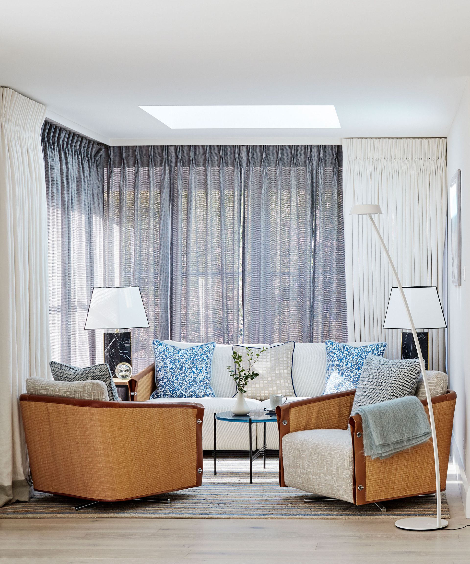 Coastal living room with blue and white soft furnishings