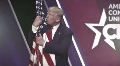 President Trump kissing a flag.