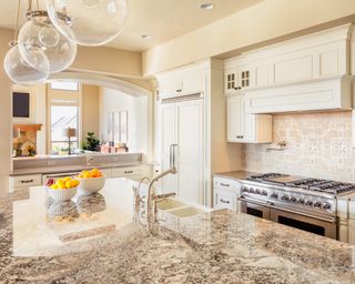 Bright kitchen with granite countertops