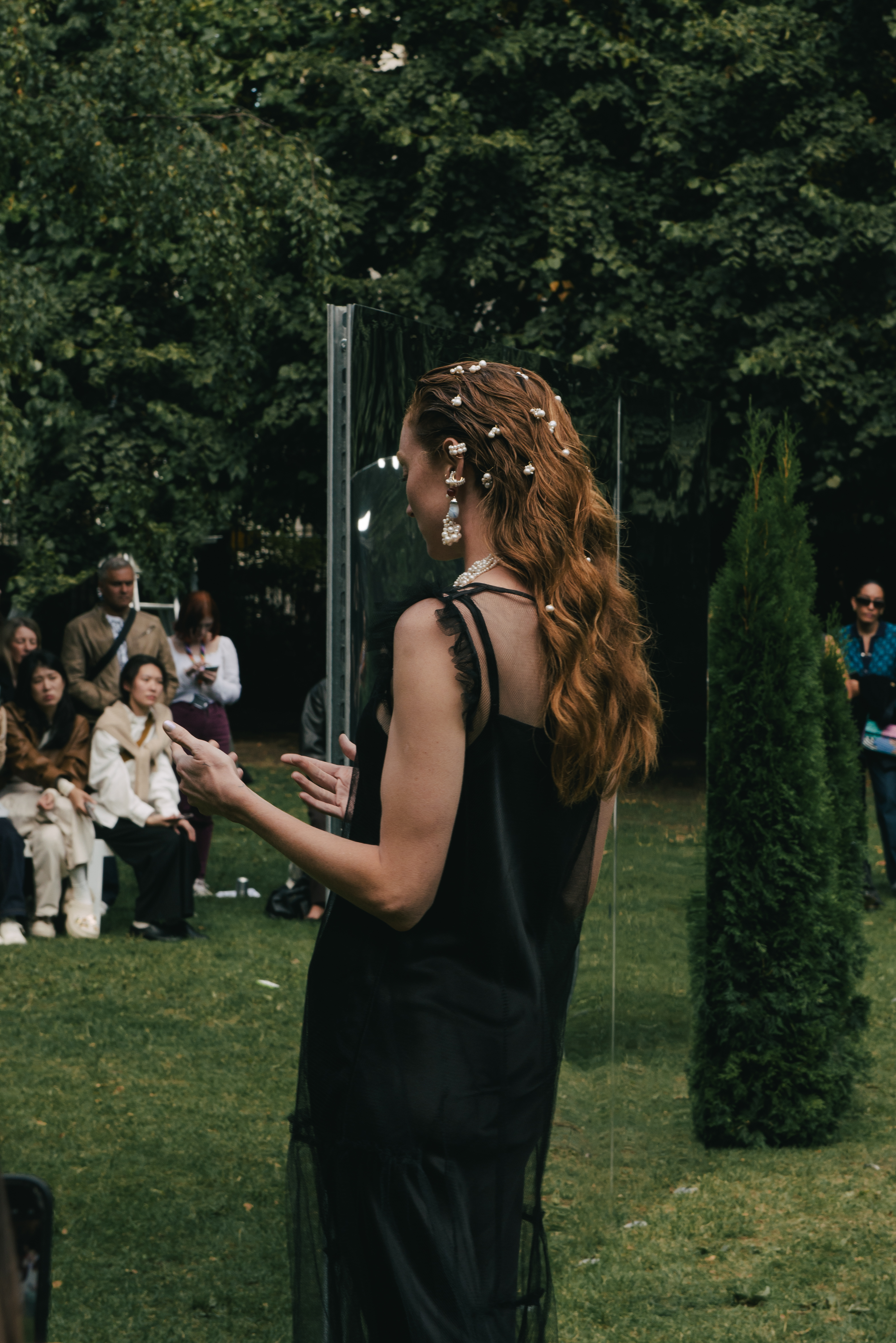 Lily Cole performing at the Completedworks SS25 show