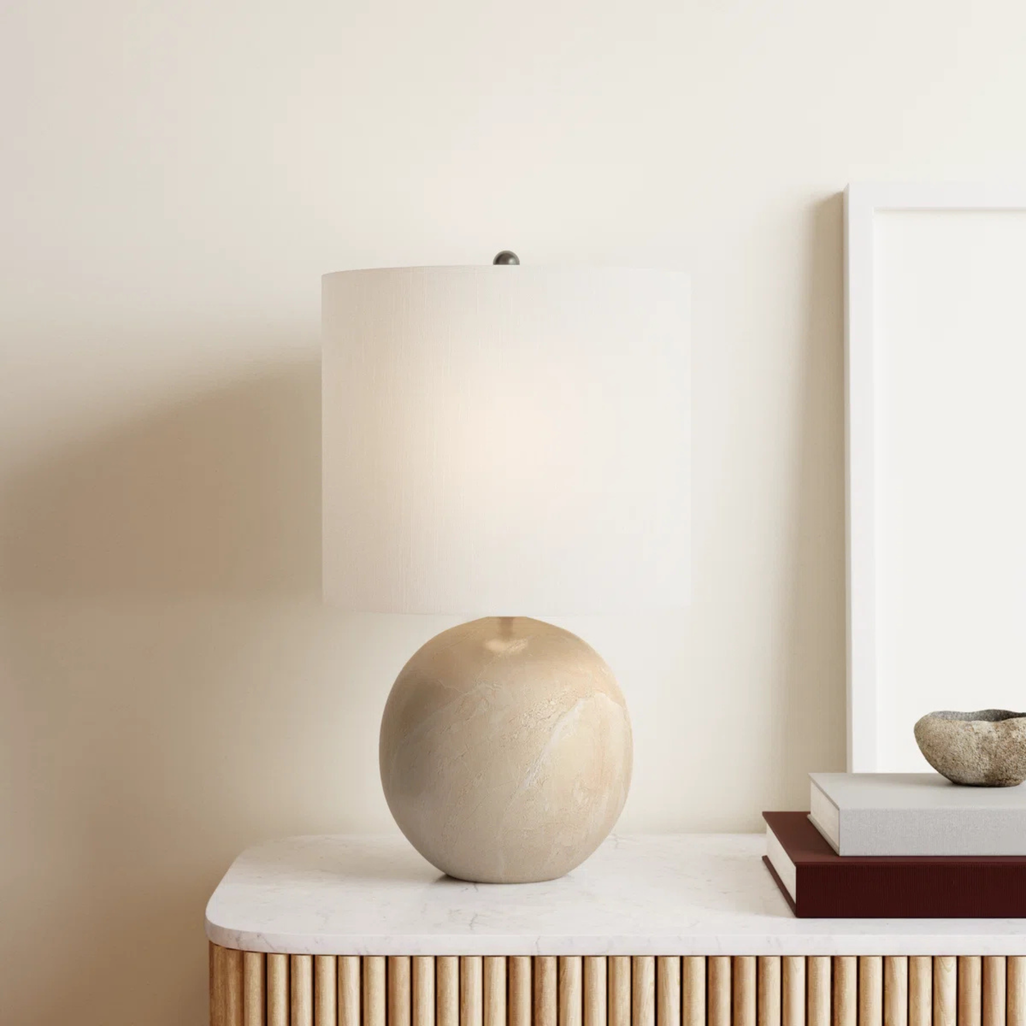 A marble table lamp with a spherical base