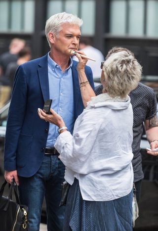Phillip gets his make-up touched up on set (ITV Pictures)