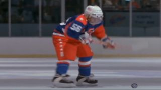 Kenan Thompson gets ready to shoot a knuckle puck in Mighty Ducks 2.