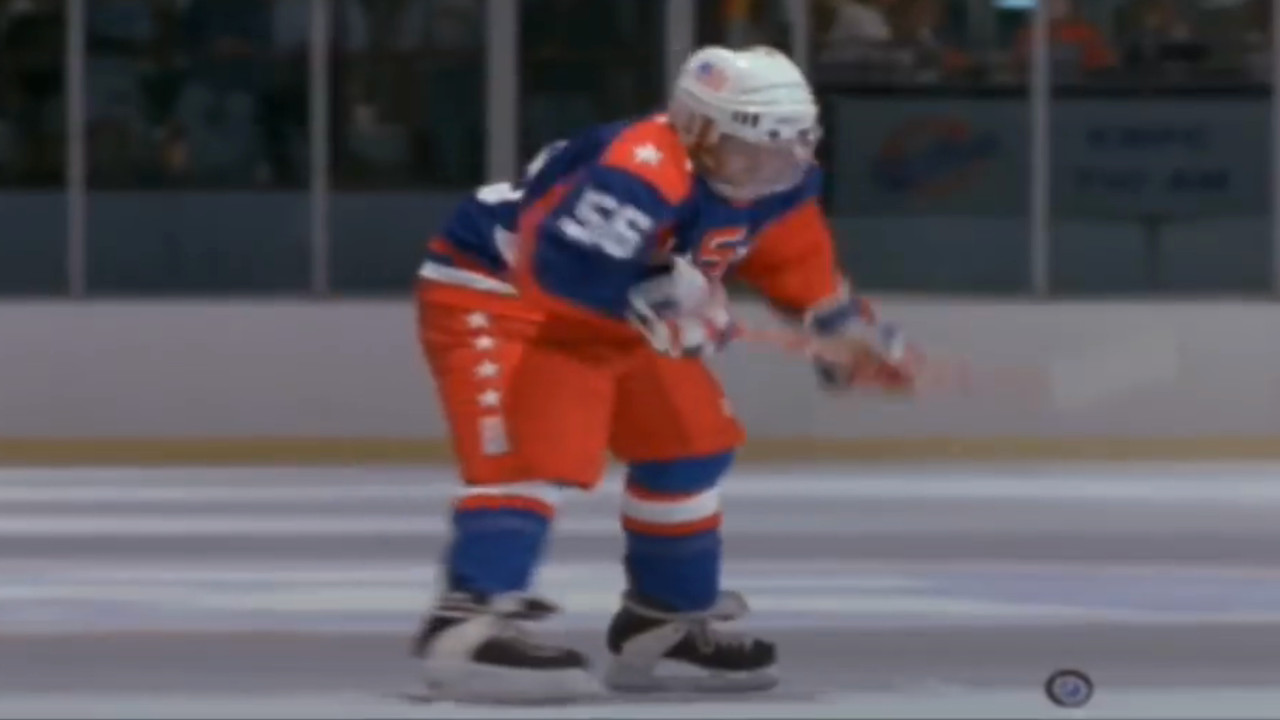 Kenan Thompson gets ready to shoot a knuckle puck in Mighty Ducks 2.