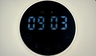 hOmeLabs Sunrise Alarm Clock digital time display and LED buttons on clock front.