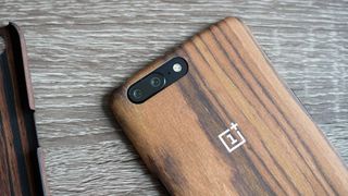 OnePlus 5 wood case lying on a table
