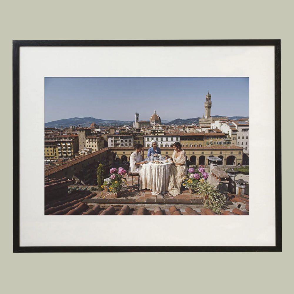 Getty Images Santa and Serena Antonelli Small Framed Print against pale green background.