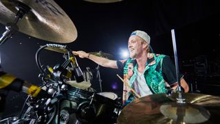 Rufus Taylor of The Darkness at his DW Collectors Series drum kit, January 2023