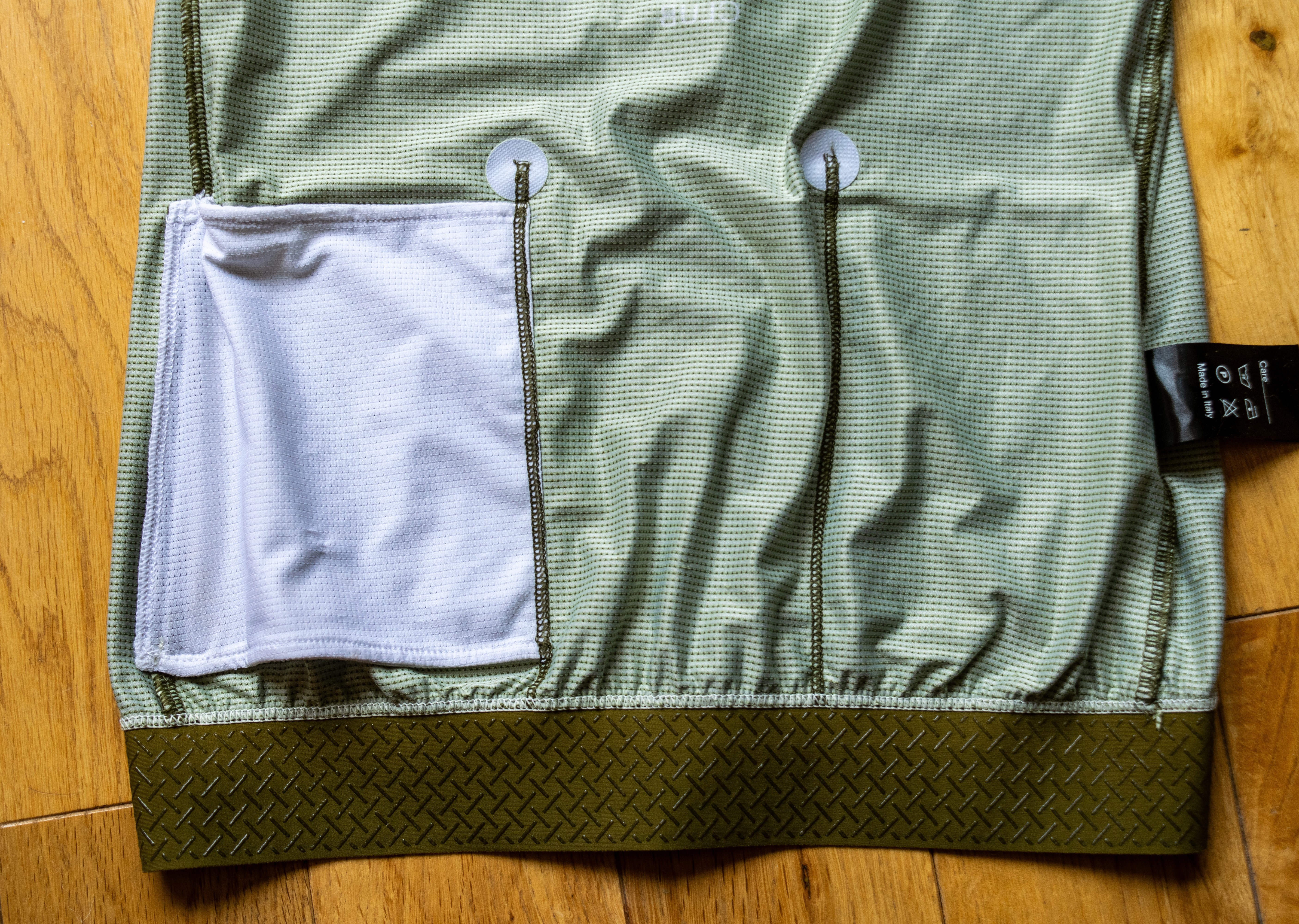 A green PNS Mechanism jersey