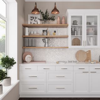 White kitchen cabinets and open shelves with reflective tile backsplash