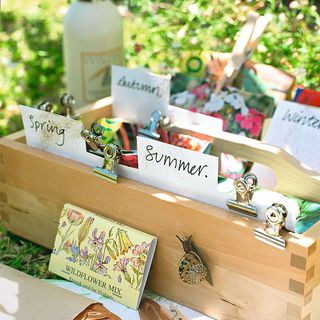 plant seed packets on wooden box