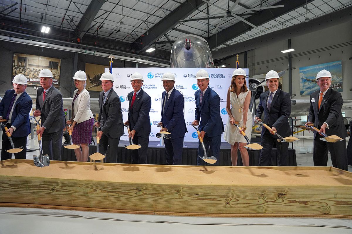 Houston Mayor Sylvester Turner, sixth from left, Houston Airports director Mario Diaz, fifth from left and Collins Aerospace vice president Allen Flynt, fourth from right, join other city, spaceport and company officials in ceremonially breaking ground for Collins Aerospace’s new campus at Houston Airport on Monday, June 7, 2021 at the Lone Star Flight Museum at Ellington Airport in Houston, Texas. 