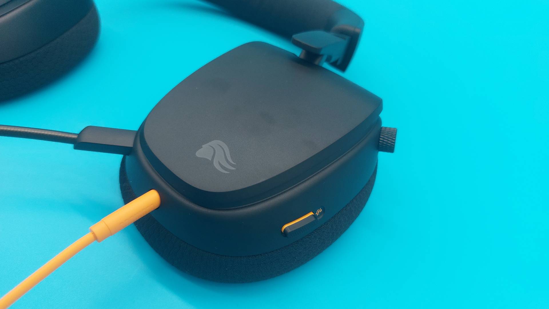 The Glorious GHS Eternal and GHS Eternal RGB wired gaming headsets in white and black, seen from various angles.