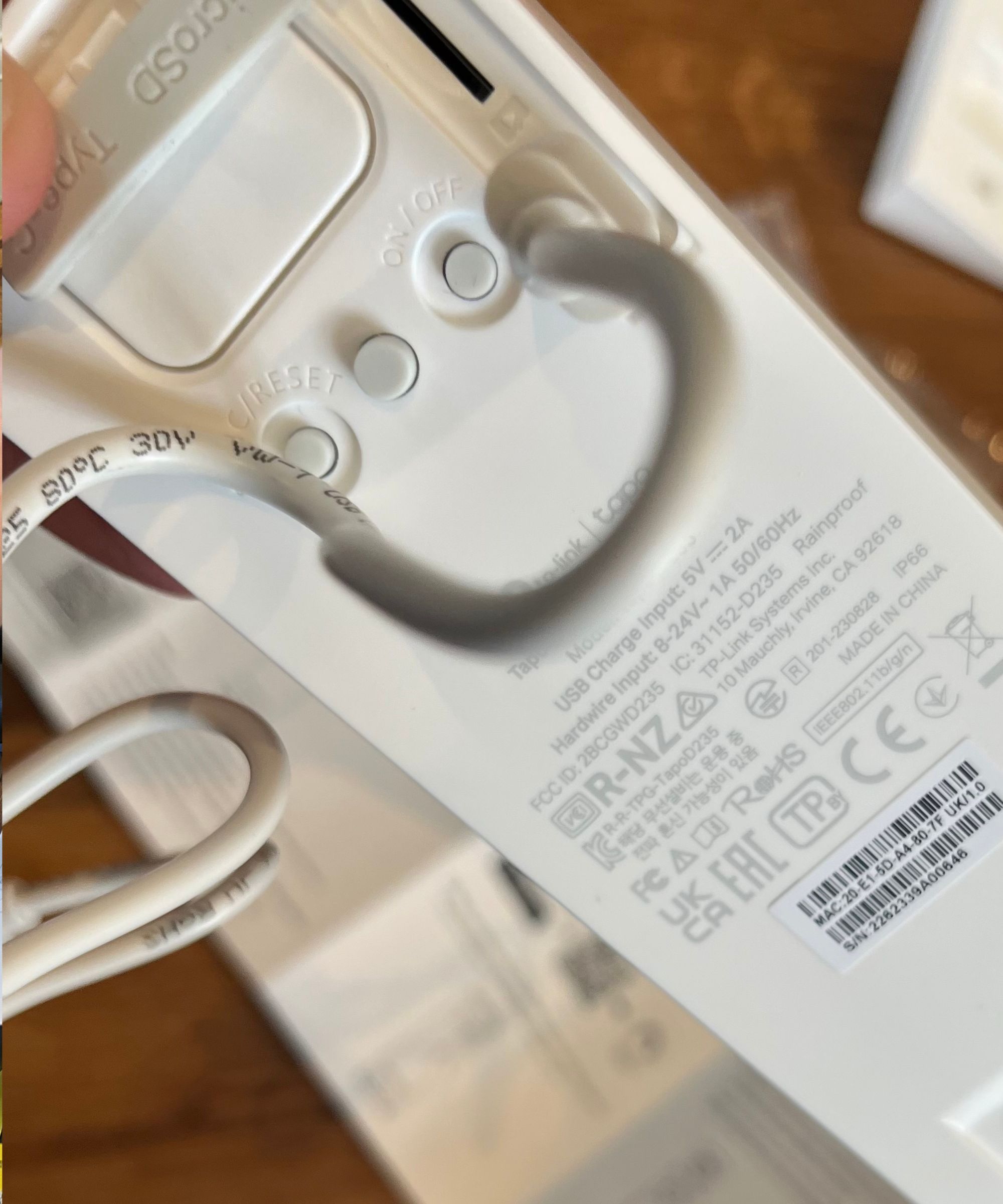 The Tapo D235 can be charged through a port in the back of the device.