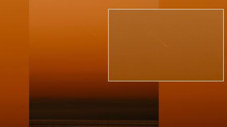 comet g3 atlas in an orange sky at dusk above water, an inset image shows the comet close up.