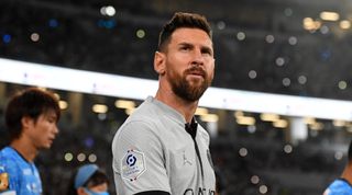  Lionel Messi of Paris Saint-Germain walks onto the pitch prior to the preseason friendly match between Paris Saint-Germain and Kawasaki Frontale at National Stadium on July 20, 2022 in Tokyo, Japan