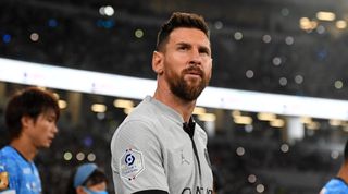 Lionel Messi of Paris Saint-Germain walks onto the pitch prior to the preseason friendly match between Paris Saint-Germain and Kawasaki Frontale at National Stadium on July 20, 2022 in Tokyo, Japan