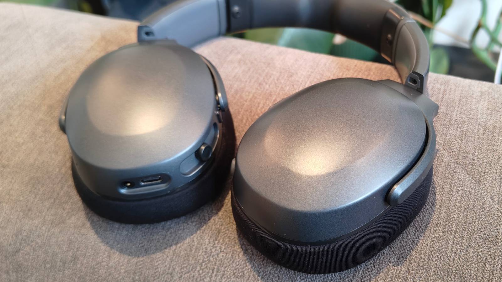 The Skullcandy Crusher 540 Active on a sofa.