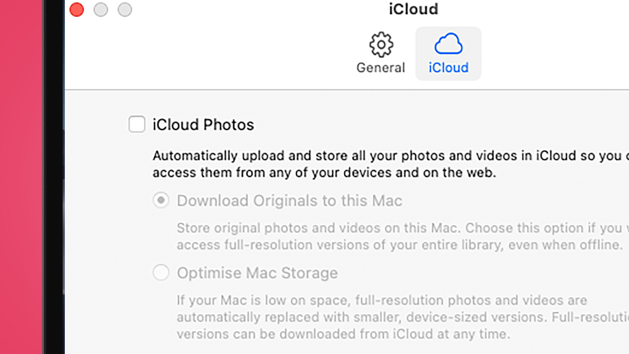 A MacBook screen showing an iCloud options window