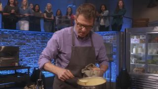 Bobby Flay cooking in Beat Bobby Flay