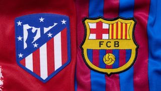 Badges of La LIga soccer teams Atletico Madrid and Barcelona