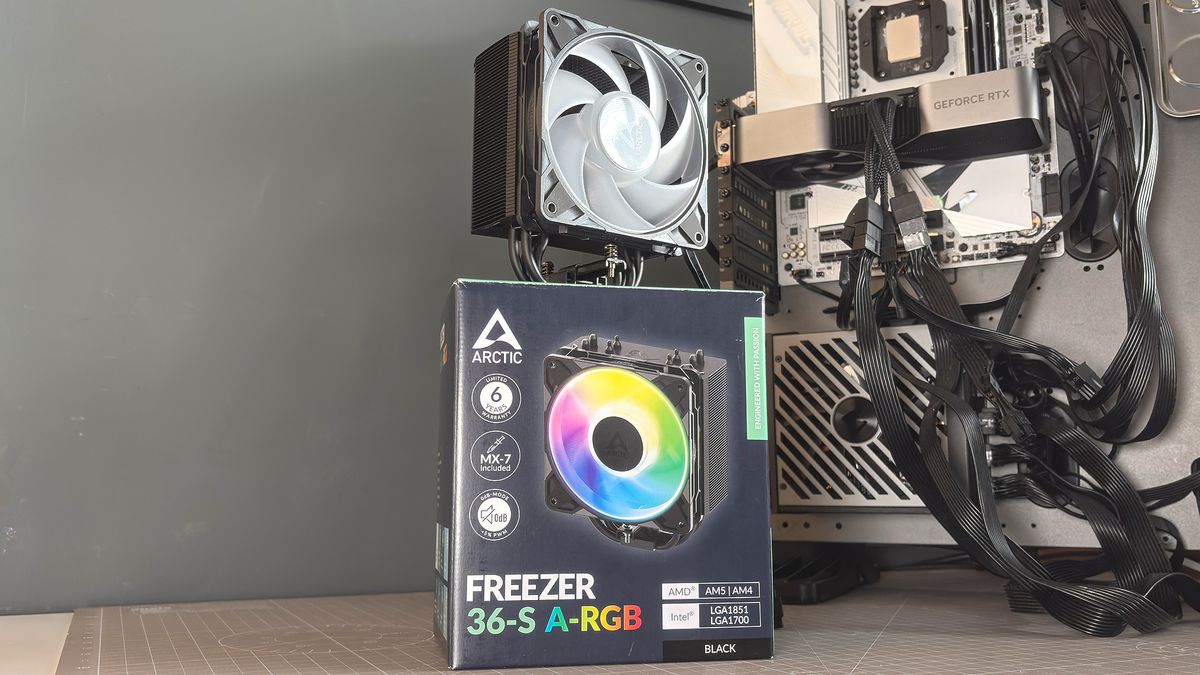 An Arctic Freezer 36-S on a desk and installed in a gaming PC, with the Freezer 36 nearby.