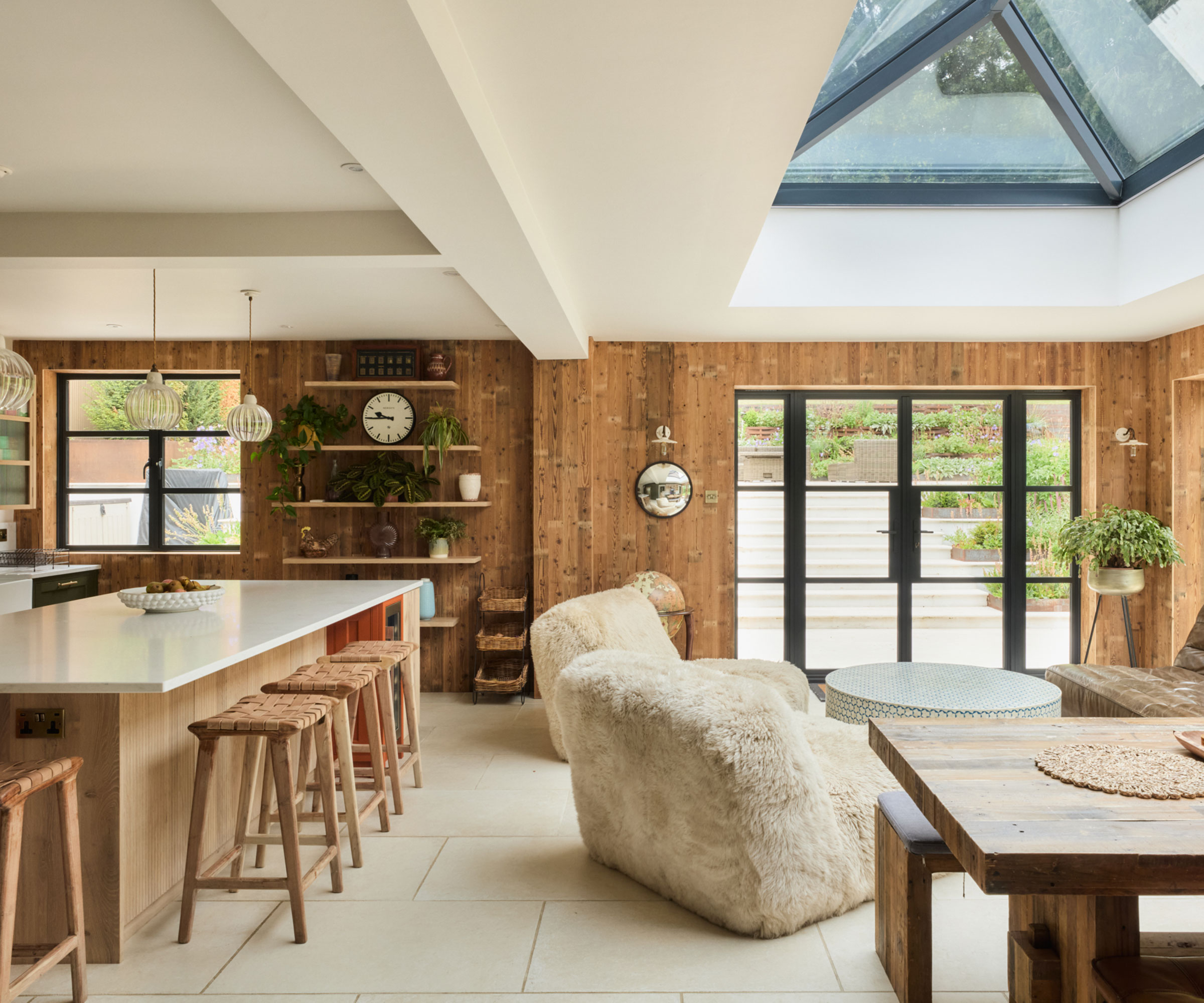 rustic wooden kitchen with open plan seating area