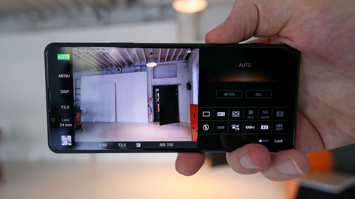 A hand holding the Sony Xperia Pro-I phone