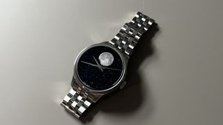 The Christopher Ward C1 MoonPhase on a grey background