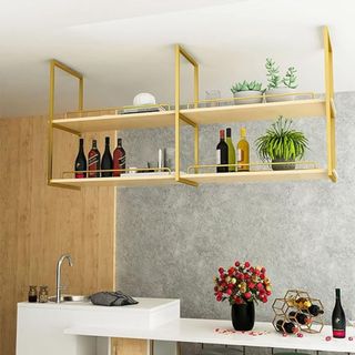 Kitchen with gold hanging wine rack