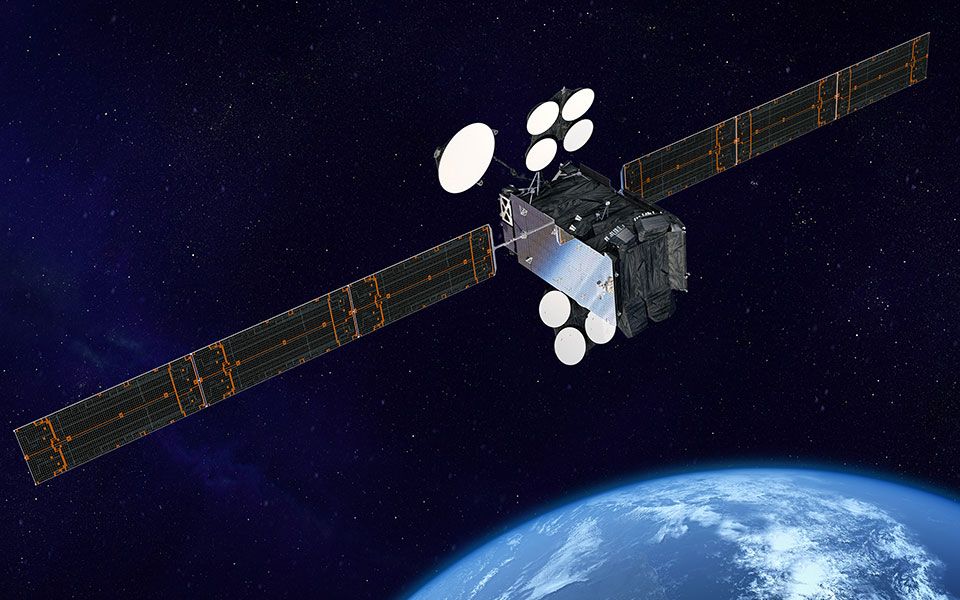 A Boeing satellite orbits the Earth.